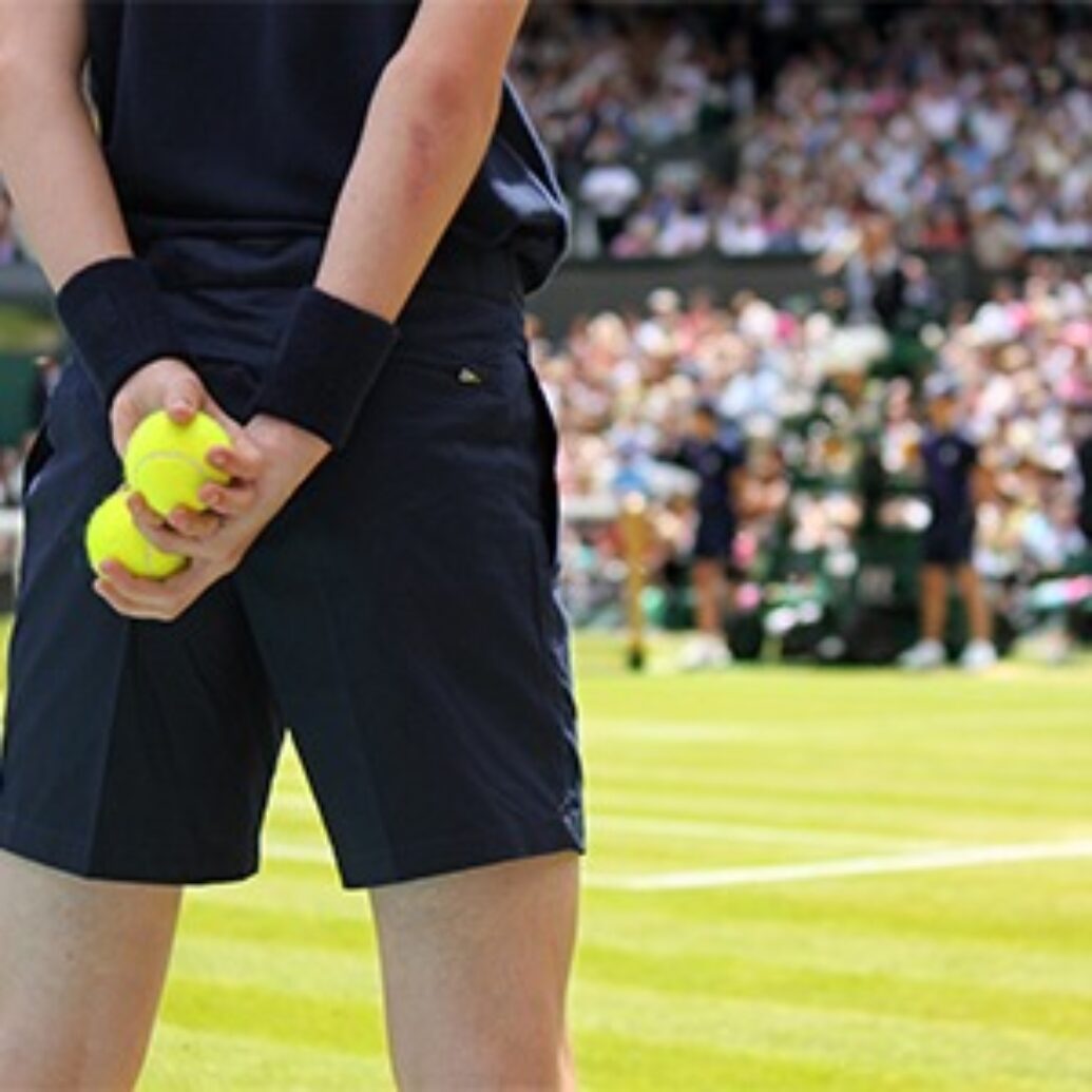 A ball boy at a match at Wimbledon